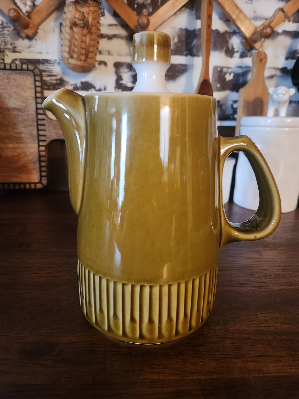 Vintage Denby Langley "Patrician" coffee pot in an olive gold color, 1964
